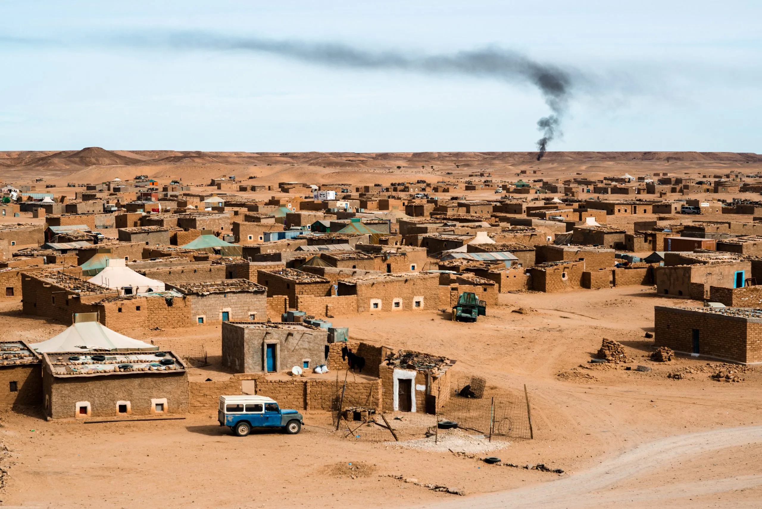 Smoke rising above the Western Sahara refugee camp of Layoon in Tindouf, Algeria.